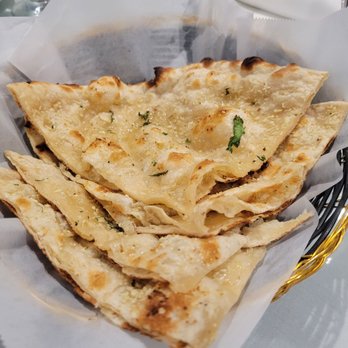 Grand Taj - Garlic Naan is but one of many Naan options. - Indian Near Me - Riverside, California