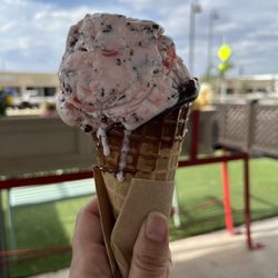Julie & Sammy's Ice Cream Parlor - Yum!! Cherry chocolate chip. 1 Scoop Ice Cream in a chocolate dipped waffle cone.