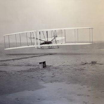 Wright Brothers National Memorial - Photo of first airplane takeoff - Landmarks & Historical Buildings Near Me - Kill Devil Hills, North Carolina