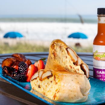 Longboards Oceanfront Grille - a plate of food and a bottle of sauce - Wine Bars Near Me - Melbourne, Florida Longboards Oceanfront Grille - a plate of food and a bottle of sauce - Wine Bars Near Me - Melbourne, Florida