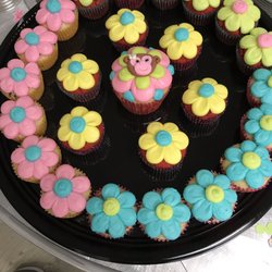 Little Feet Treats - Red velvet and vanilla chocolate chip cupcakes for our baby's first birthday. So cute!
