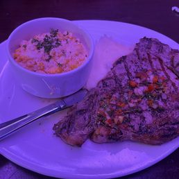 Ribeye with mash potatoes and street corn Ribeye with mash potatoes and street corn