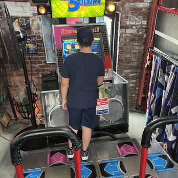 Hometown Arcade - Get your dance steps in if you dare. This isn't as easy as it looks... - Arcades Near Me - Norwood, Massachusetts Hometown Arcade - Get your dance steps in if you dare. This isn't as easy as it looks... - Arcades Near Me - Norwood, Massachusetts