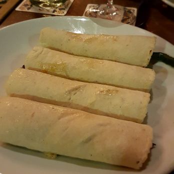 Hugo's - Queso Flameado; extremely tasty meat and cheese appetizer - Mexican Near Me - Houston, Texas