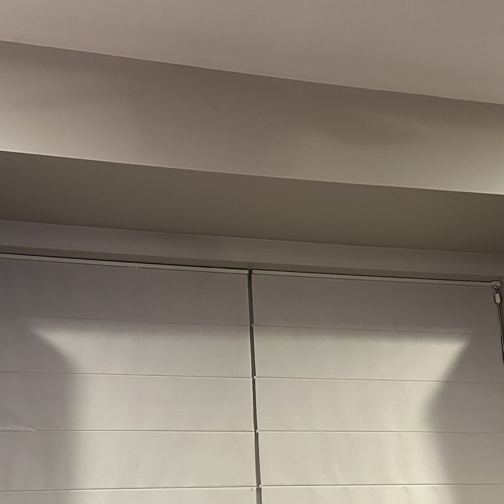 Photo of shelves holding bookshelf speakers.