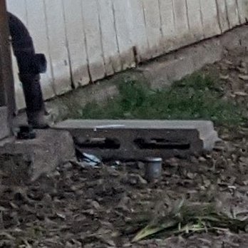 Mesa Septic & Rooter Service - Pipe from kitchen and stake can be seen looking at the brick - Septic Services Near Me - Mesa, Arizona Mesa Septic & Rooter Service - Pipe from kitchen and stake can be seen looking at the brick - Septic Services Near Me - Mesa, Arizona