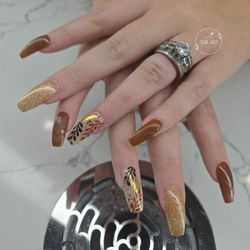 Nail Art Studio & Spa - Perfect combo of gold, black, & brown! Such an elegant nail design!