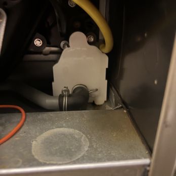 Meade's Heating and Air - Area where condensation flowed into electrical control panel area from hole drilled into PVC pipe by tech in next picture - Heating & Air Conditioning/HVAC Near Me - Sterling, Virginia