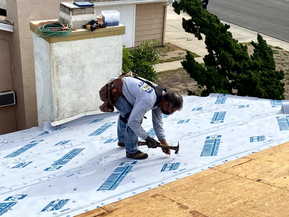 Slide of Dana Logsdon Roofing & Solar