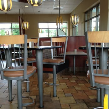 McDonald's - empty tables and chairs in a restaurant - Coffee & Tea Near Me - Oak Ridge, North Carolina