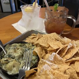 Artichoke dip and a Michilada. Artichoke dip and a Michilada.