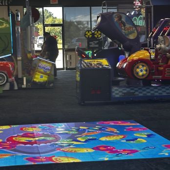 Chuck E. Cheese - a brightly colored carpet in a children's play area - Pizza Near Me - Greeley, Colorado Chuck E. Cheese - a brightly colored carpet in a children's play area - Pizza Near Me - Greeley, Colorado