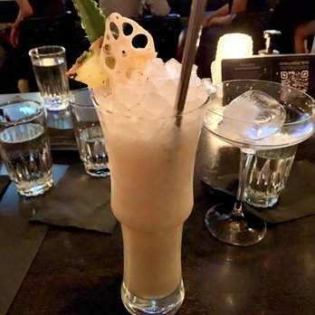 The Roosevelt Room - Painkiller cocktail - Cocktail Bars Near Me - Austin, Texas The Roosevelt Room - Painkiller cocktail - Cocktail Bars Near Me - Austin, Texas