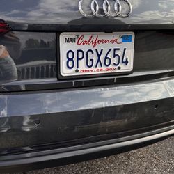 Caliber Collision - Original damage and emblem placement. All 4 screws present