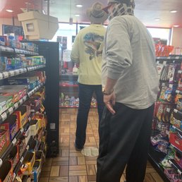 two men in a grocery store