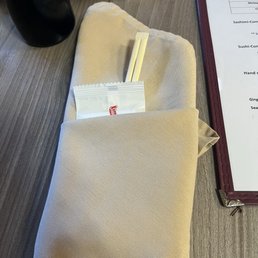 Nice service: a wet towelette with the chopsticks. Nice service: a wet towelette with the chopsticks.