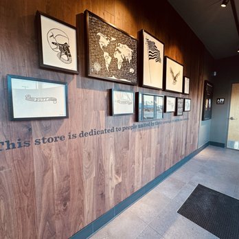 Starbucks - the store's entrance with a wooden wall - Coffee & Tea Near Me - Hampton, Virginia