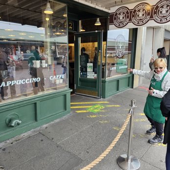 Starbucks - The bouncer keeps the flow of people under control. - Coffee & Tea Near Me - Seattle, Washington Starbucks - The bouncer keeps the flow of people under control. - Coffee & Tea Near Me - Seattle, Washington