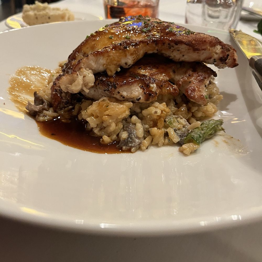The Capital Grille - Roasted Chicken Breast with Mushrooms and Parmesan Risotto - Steakhouses Near Me - Louisville, Kentucky The Capital Grille - Roasted Chicken Breast with Mushrooms and Parmesan Risotto - Steakhouses Near Me - Louisville, Kentucky