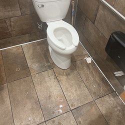 Circle K - Water everywhere and toilet paper on the floor