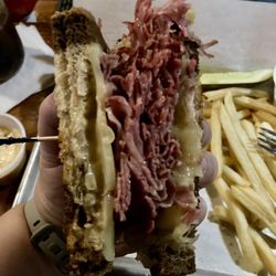 The Bowery Grille & Pub - Rueben Sandwich with fries, pickle and coleslaw
