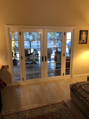 French Patio Doors - French Door Features

Anlin In-Glass Pet Doors
Anlin Malibu swinging French doors can be made with an in-glass pet door built right into the glass. Anlin Pet Doors are available in four sizes so you can choose the size just right for your pet. You will love the look and the freedom it gives you and your pets.

Anlin Security
Swinging French doors feature a 3-point locking system plus a deadbolt. The keyed lock activates three solid metal posts, one each at the top, middle and bottom of the door, while a deadbolt adds yet another level of security.

French Door Sidelights
Operable Sidelights are available as in-swing only and include screens on the outside.

https://americanwindowconcepts.com/services/french-patio-doors/
