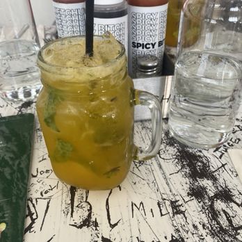 Bacon Bitch - Mango mojito...really strong, but the restaurant manager in me hates the brown mint leaves - Breakfast & Brunch Near Me - Miami, Florida