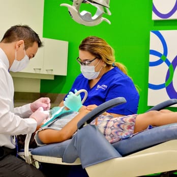 Burleson Pediatric Dentistry - Dr. Walton at work - Pediatric Dentists Near Me - Burleson, Texas Burleson Pediatric Dentistry - Dr. Walton at work - Pediatric Dentists Near Me - Burleson, Texas