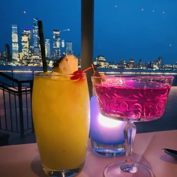 Chart House - Malibu cocktail and Tequila infused pink drink - Seafood Near Me - Weehawken, New Jersey Chart House - Malibu cocktail and Tequila infused pink drink - Seafood Near Me - Weehawken, New Jersey