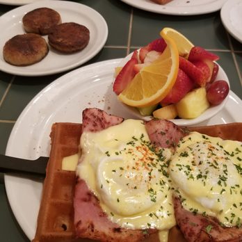 More Than Waffles - Eggs Benedict on top of a Belgium Waffle with fruit & an extra side of sausage - Breakfast & Brunch Near Me - Encino, California