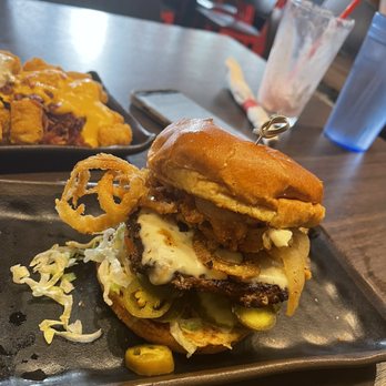 Basement Burger Bar - Build- Your Own Burger with pepper jack, fried onion rings, bison meat, peppers, and lettuce. - American Near Me - Detroit, Michigan