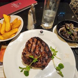 Angus Steak House - 12oz Ribeye with Chunky Chips and Mushrooms