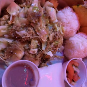 Cuckoo Coconuts Waikiki - Kahlua pork with rice and poi. Poi was spoiled (sour). Food overall was pretty bad. - Cocktail Bars Near Me - Honolulu, Hawaii