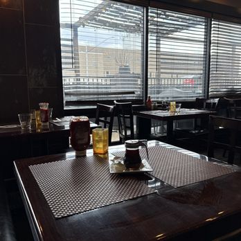 Risotto - This is with no one sitting at the table chairs back to back. - Mediterranean Near Me - Albany, New York Risotto - This is with no one sitting at the table chairs back to back. - Mediterranean Near Me - Albany, New York