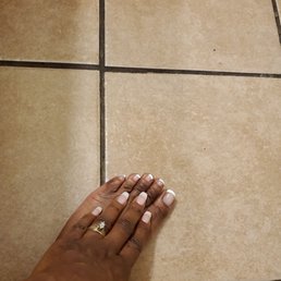 White nail tips with french polish change. White nail tips with french polish change.
