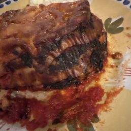 Burned lasagne, but freezing cold in the middle.