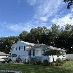 Pro Touch Roofing - GAF HDZ Charcoal shingles going up