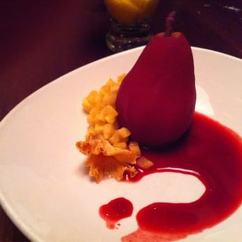 Nada - Sangria poached pear whipped cream and cream cheese filling caramelized pineapples - Mexican Near Me - Cincinnati, Ohio Nada - Sangria poached pear whipped cream and cream cheese filling caramelized pineapples - Mexican Near Me - Cincinnati, Ohio