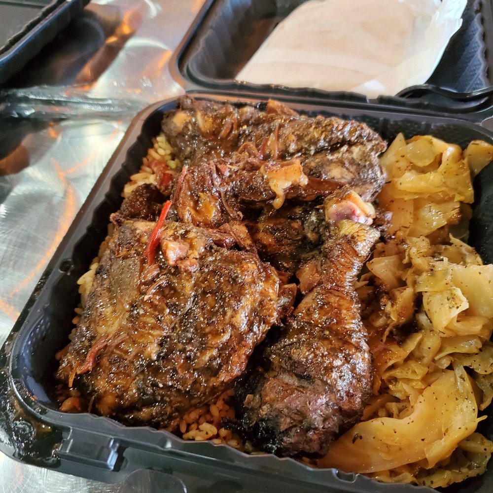 Ka'ribbean Fire - Half jerk chicken, cabbage, and rice and peas. - Caribbean Near Me - La Plata, Maryland Ka'ribbean Fire - Half jerk chicken, cabbage, and rice and peas. - Caribbean Near Me - La Plata, Maryland