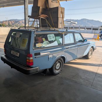 IKEA - A side view of a Volvo loaded with IKEA merchandise outside the front door. - Home Decor Near Me - Burbank, California