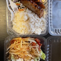 Lao sausage with steamed rice ( they don't have sticky rice ) Lao style papaya Salad Lao sausage with steamed rice ( they don't have sticky rice ) Lao style papaya Salad