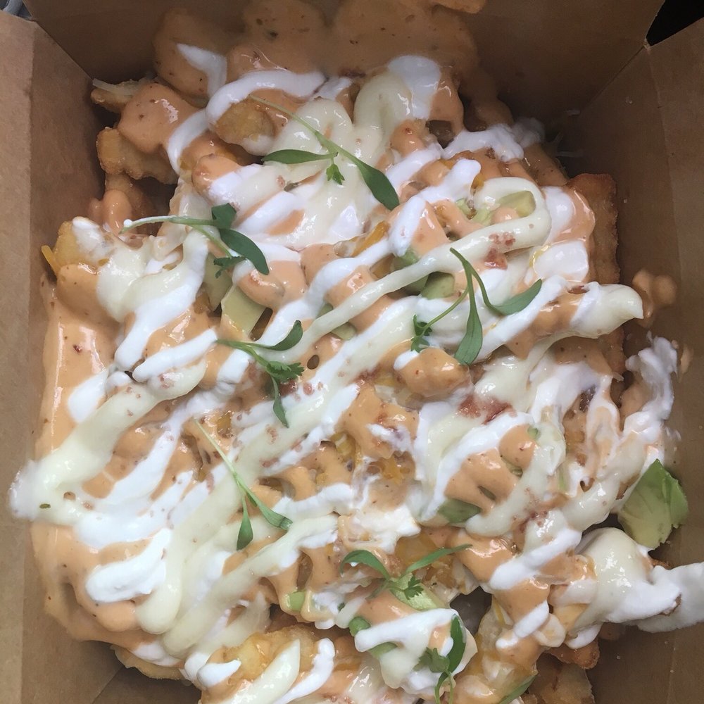 Rock-A-Belly - Fries smothered in so many delicious toppings, including fresh avocado! - Food Trucks Near Me Rock-A-Belly - Fries smothered in so many delicious toppings, including fresh avocado! - Food Trucks Near Me