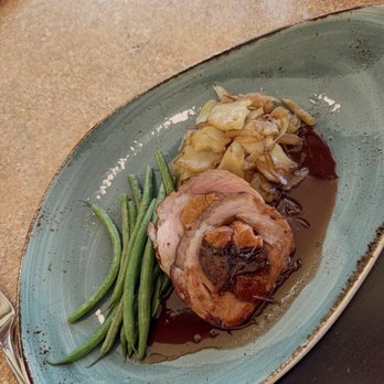 The Pearl - SLICED STUFFED PORKLOIN WITH APRICOT AND PRUNE MUI Lyonnaise Potatoes, Cranberry Cumberland Sauce - New American Near Me - Pearl City, Hawaii