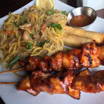 Barkada Grill - Lunch combo! $12.95: bbq chicken, mixed noodles with chicken, spring rolls and pickled mango - Asian Fusion Near Me - Red Deer, Alberta Barkada Grill - Lunch combo! $12.95: bbq chicken, mixed noodles with chicken, spring rolls and pickled mango - Asian Fusion Near Me - Red Deer, Alberta