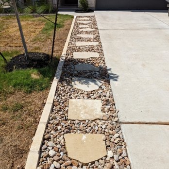 Primos Landscaping - a gravel path in front of a house - Landscaping Near Me - Leander, Texas Primos Landscaping - a gravel path in front of a house - Landscaping Near Me - Leander, Texas