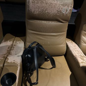 Studio Movie Grill - Disgusting seats - Cinema Near Me - Seminole, Florida