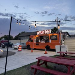 Canelos Taqueria - Taco Truck and seating area