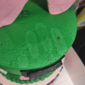 Olde Town Bakery - a green cake with a pink elephant on top - Bakeries Near Me - Moline, Illinois