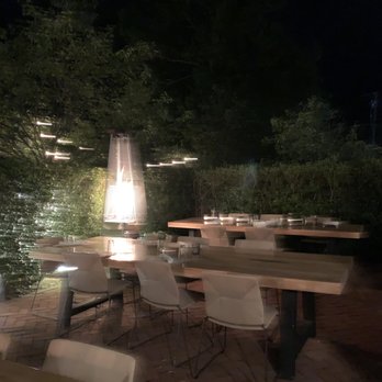 Jean Georges - Topping Rose House - Outdoor dining area - New American Near Me - Bridgehampton, New York Jean Georges - Topping Rose House - Outdoor dining area - New American Near Me - Bridgehampton, New York