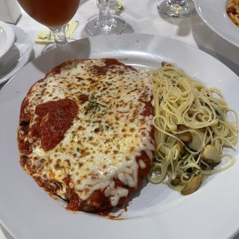 Buona Sera Ristorante - Pollo alla Parmigiana with capellini in an oil and garlic sauce - Italian Near Me - Havertown, Pennsylvania Buona Sera Ristorante - Pollo alla Parmigiana with capellini in an oil and garlic sauce - Italian Near Me - Havertown, Pennsylvania